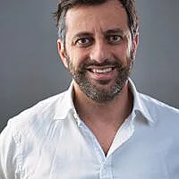 Dr. Christopher Gauci